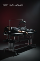 Person using cervical neck traction table for lumbar spine therapy - Ascent Health & Wellness